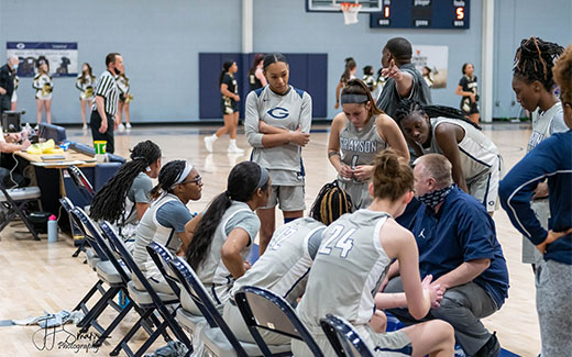 Grayson Women's Basketball Team talking during game