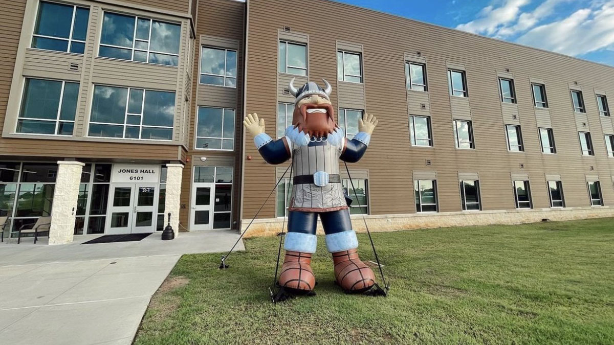 Inflatable Viking mascot anchored in front of Jones Hall